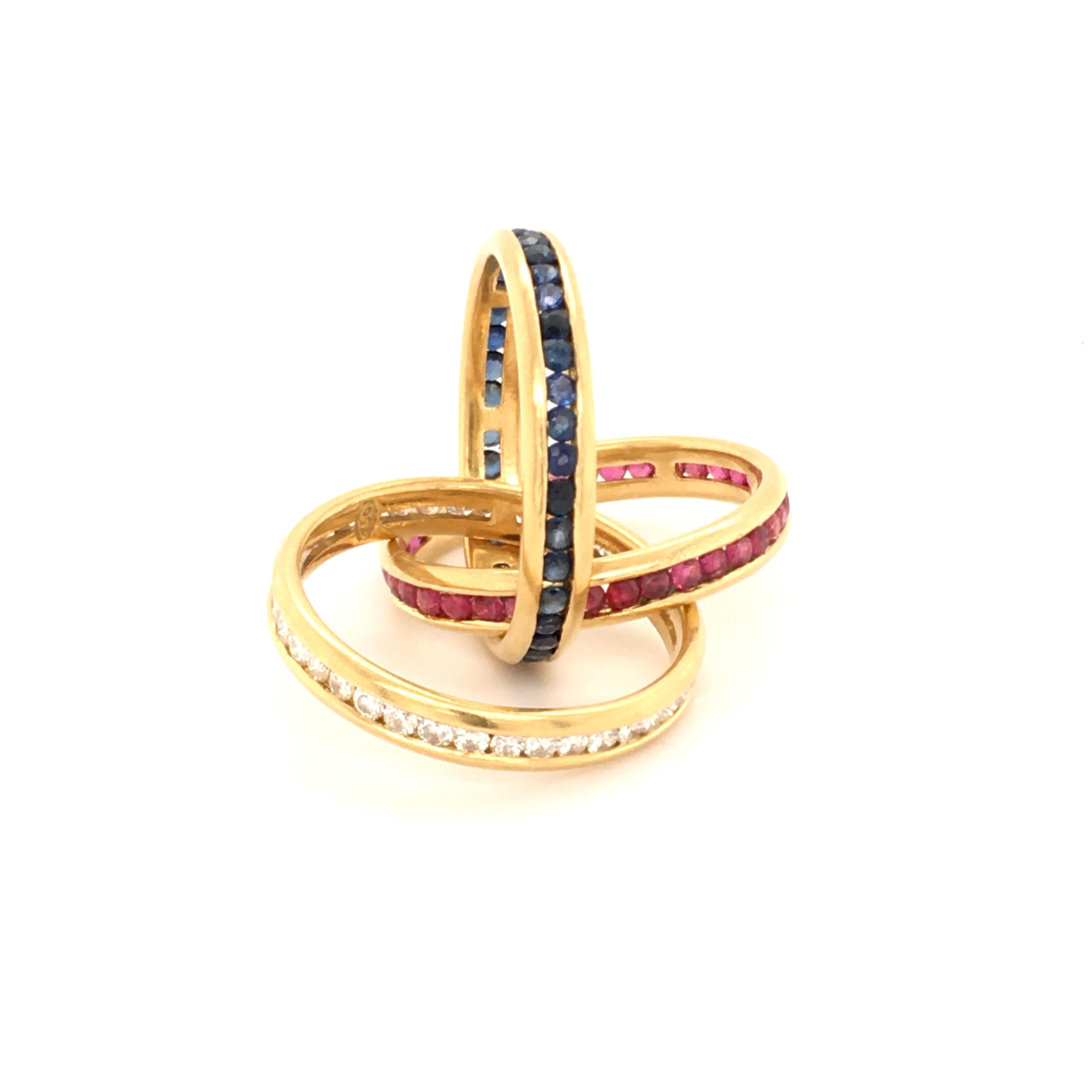 Round Cut Diamond, Ruby and Sapphire Trinity Ring in Yellow Gold