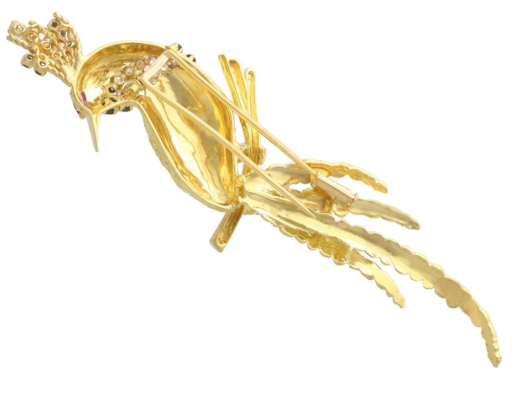 Diamond Ruby and Sapphire Yellow Gold Peacock Brooch In Excellent Condition For Sale In Jesmond, Newcastle Upon Tyne