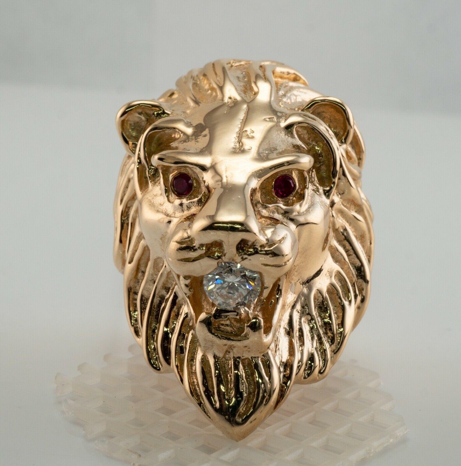 This spectacular huge vintage ring is finely crafted in solid 14K Yellow gold (carefully tested and guaranteed), and made in the shape of a Lion's head. The diamond in lions' mouth is .42 carat of SI2 clarity and H color. Two natural Earth mined