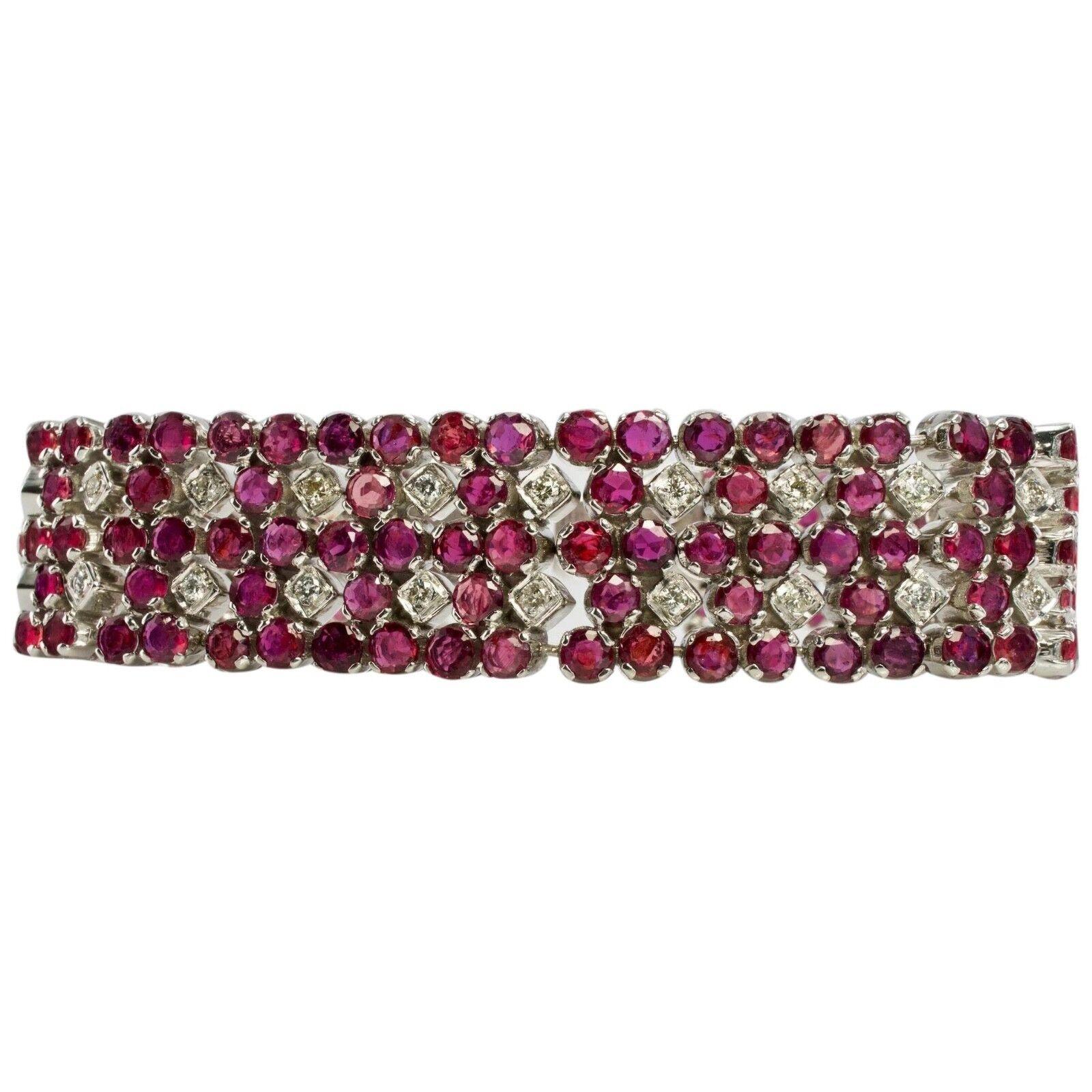 This terrific estate bracelet is finely crafted in solid 14K White Gold and set with natural Earth mined Rubies and Diamonds. There are 200 Rubies in this bracelet, grading from 2mm to 3mm for the grand total weight 20.00 carats! The rubies are very