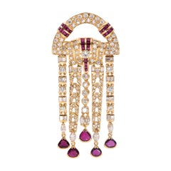 Diamond & Ruby brooch in 18k