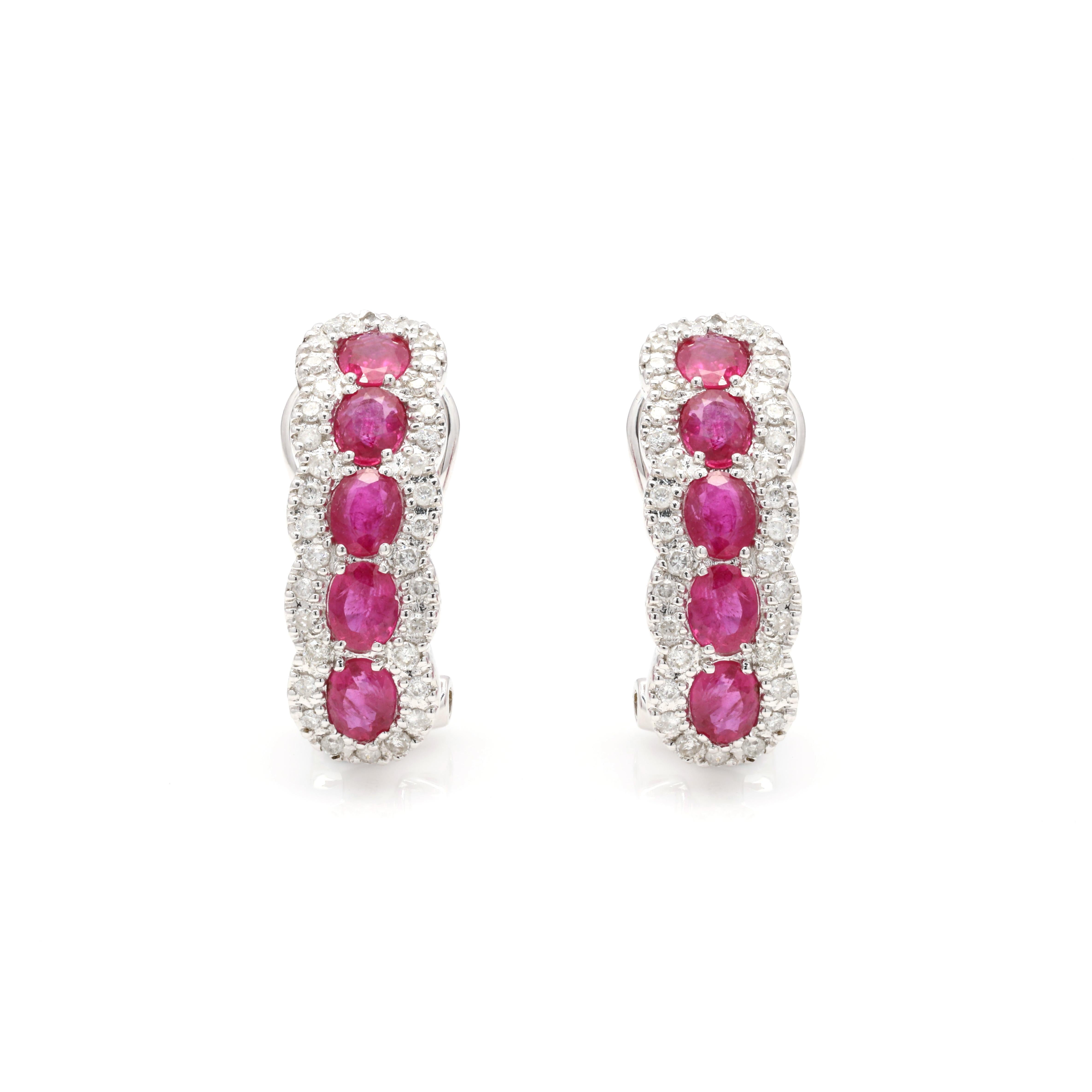 Natural Halo Diamond and Ruby Clip On Stud Earrings in 14K Gold. Embrace your look with these stunning pair of earrings suitable for any occasion to complete your outfit.
Ruby gemstone improves mental strength.
Featuring 1.92 carats of oval ruby