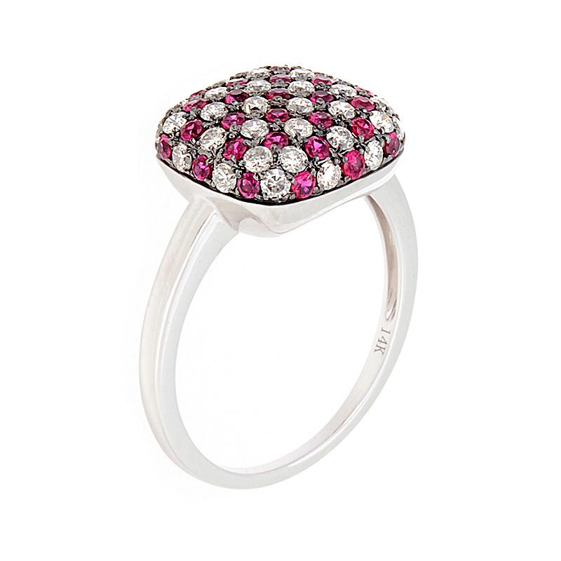 An entertaining checkboard design with alternating 0.54 carats of vivid red rubies and 0.58 carats of round diamonds.  It is set in 14K white gold, with black rhodium prongs. 

Currently ring size 7.25