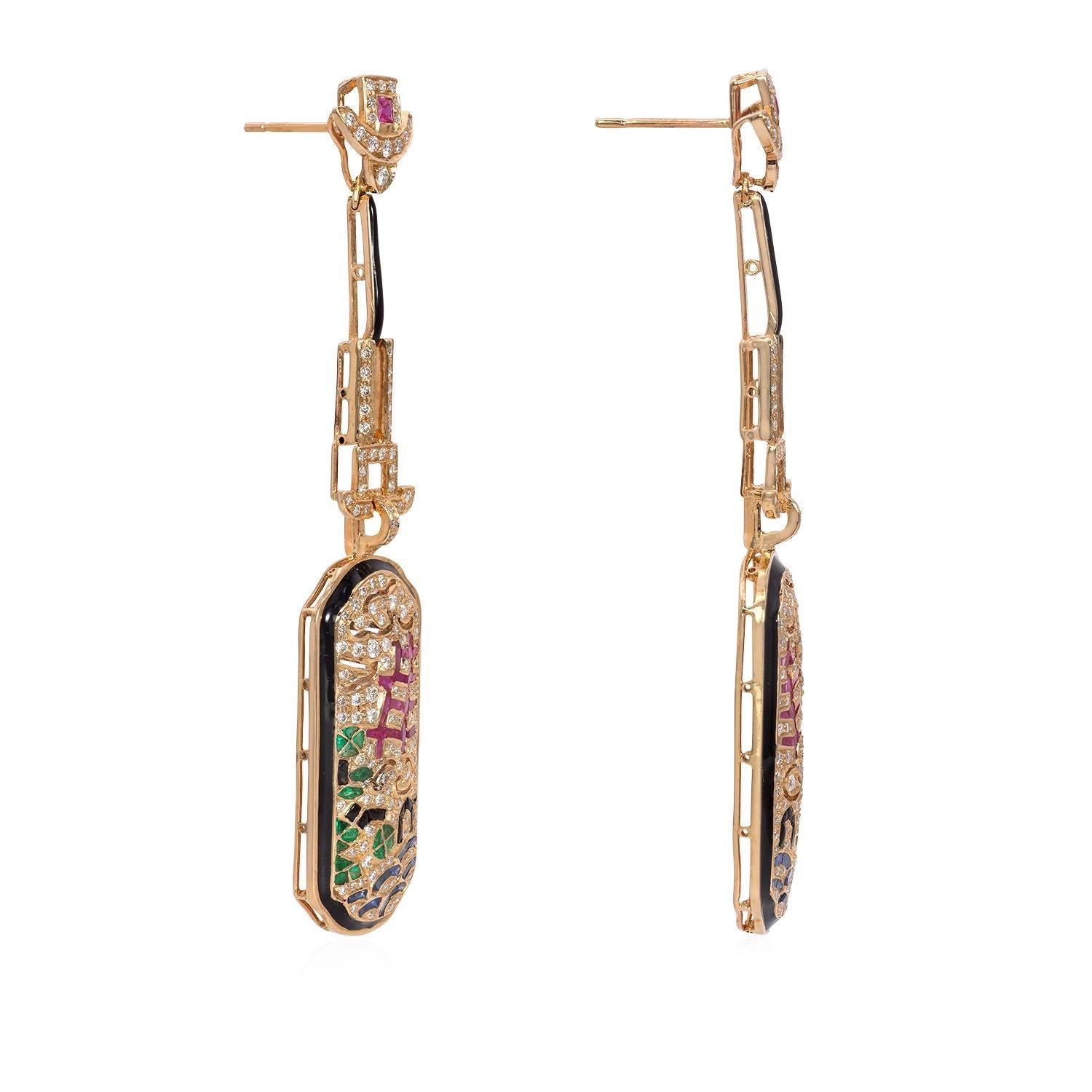 Japanese Art Deco inspired earrings, featuring natural rubies, blue sapphire and emeralds, set in 18K rose gold. 

Diamond Details 
Shape: Round Brilliant Cut Diamonds 
Color: G 
Clarity: VS 
Weight: 1.85 carats 

Earring Details: 
Metal: 18K Rose
