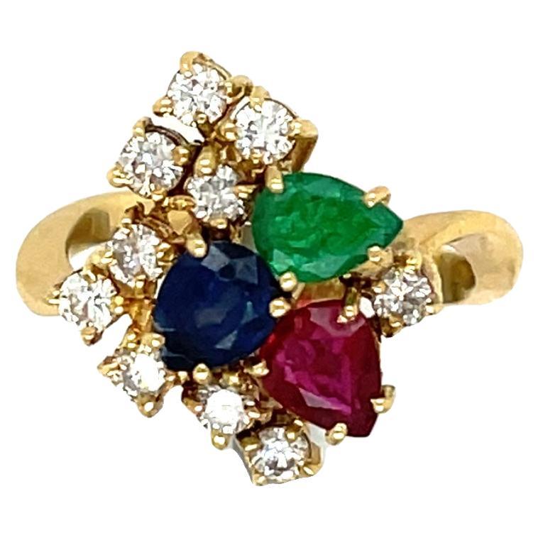 Anello a grappolo con diamante, rubino, smeraldo e zaffiro in oro giallo 18 carati