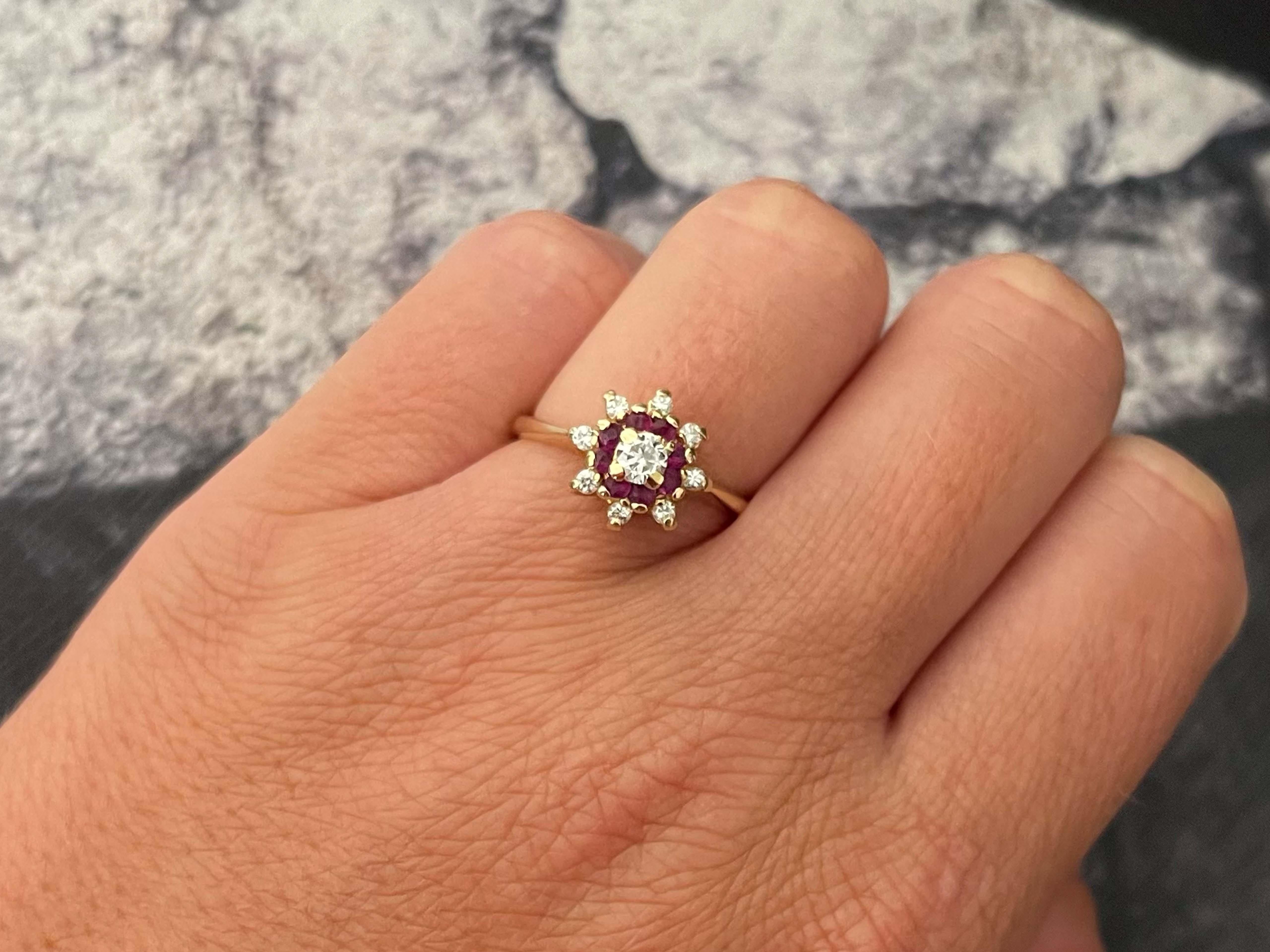 Item Specifications:

Metal: 14K Yellow Gold

Style: Statement Ring

Ring Size: 7.5 (resizing available for a fee)

Total Weight: 3.5 Grams

Gemstone Specifications:

Gemstones: 8 red rubies

Ruby Carat Weight: 0.16 carats

Diamond Carat Weight:
