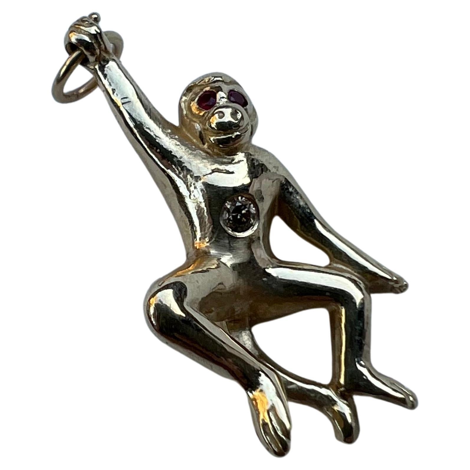 Animal jewelry  Diamond Tummy Ruby Eyes Monkey 14k Solid Gold Pendant By Designer J Dauphin

Hand made in Los Angeles

Can be worn on a chain necklace or bead necklace. Can used as a pendant on either a long necklace or a choker.