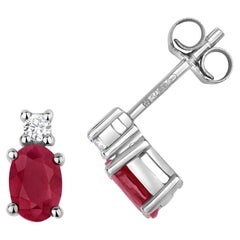 DIAMOND & RUBY OVAL CLAW SET STUDS IN 9CT WHITE Gold