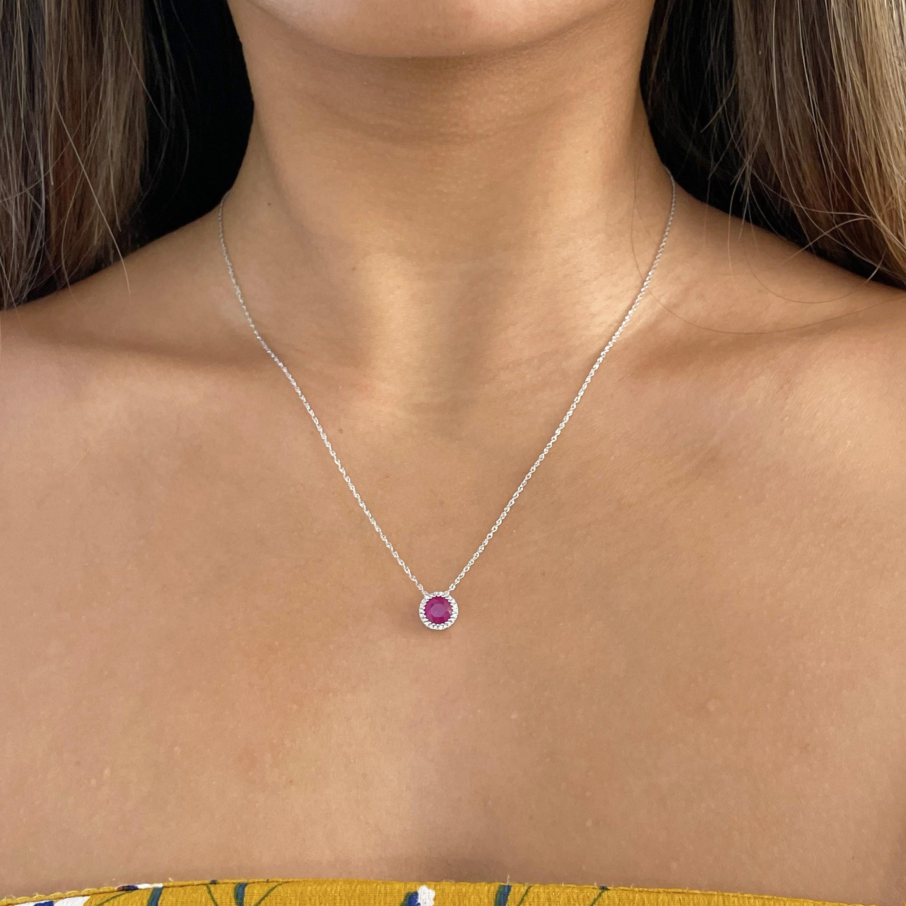 The diamond halo on this necklace contrasts beautifully with the vibrant ruby in the center. It's perfectly stunning on its own or as part of a neck stack. The details for this beautiful necklace are listed below:
Metal Quality: 14K White