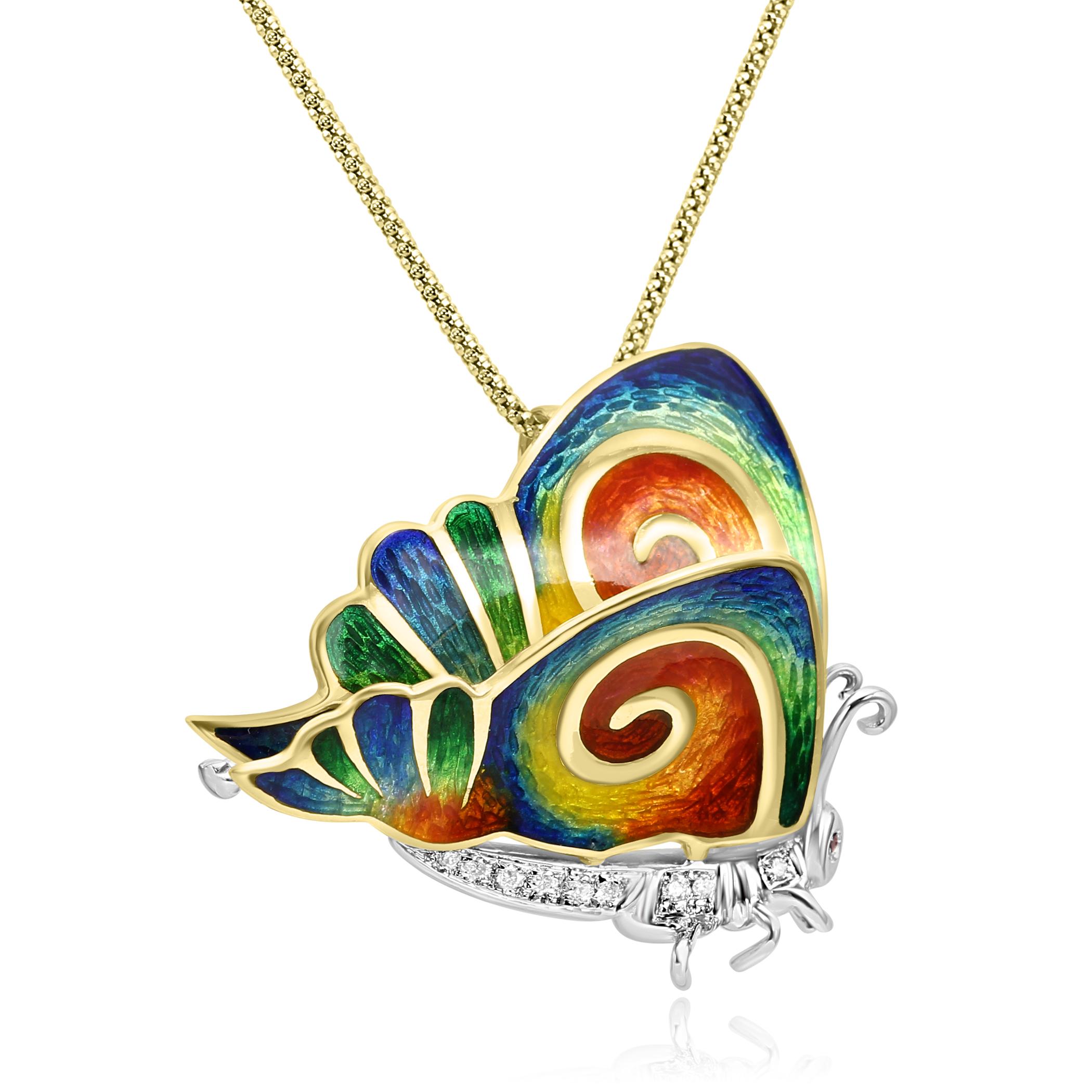 Pour tous les amoureux des insectes et de la nature, voici notre charmante et unique broche papillon en émail arc-en-ciel, rubis et diamants. 

Ce pendentif/broche présente le corps du papillon orné d'éblouissants diamants blancs de couleur F-G et