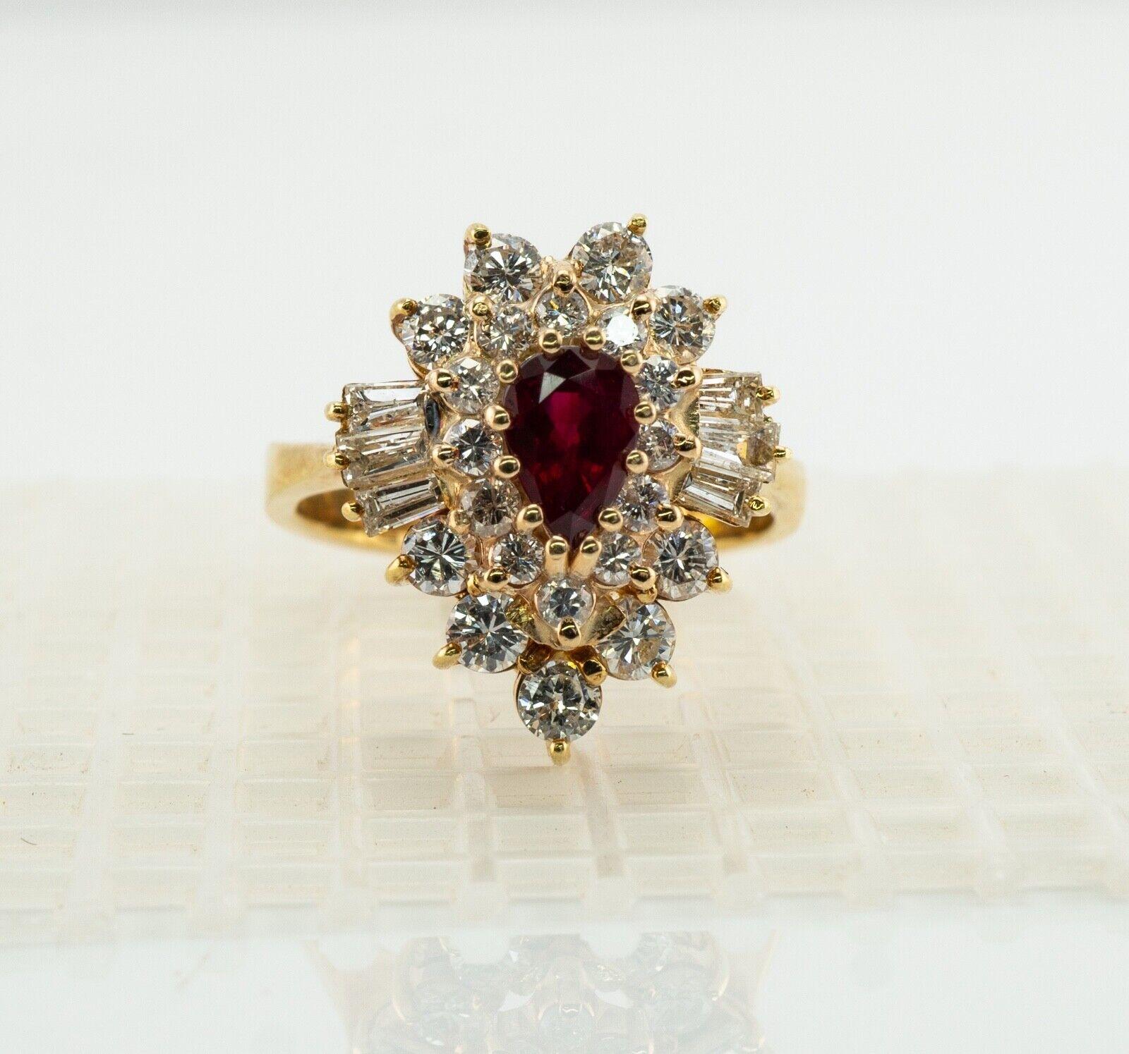 This gorgeous estate ring is finely crafted in solid 14K Yellow Gold and set with genuine Ruby and diamonds. The center Earth-mined pear cut Ruby measures 6mm x 4mm (.50 carat) and this is a very clean and transparent gem of great intensity and