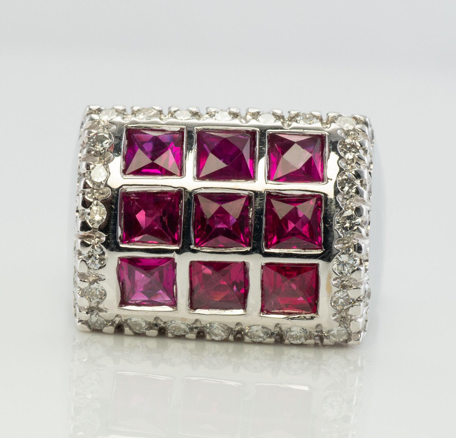 Diamond Ruby Ring 18K White Gold Band Geometric

This gorgeous estate ring is finely crafted in solid 18K White Gold and set with high quality lab-created Rubies and Diamonds. Nine square cut Rubies measure 3mm for the grand total 1.44 carats. These
