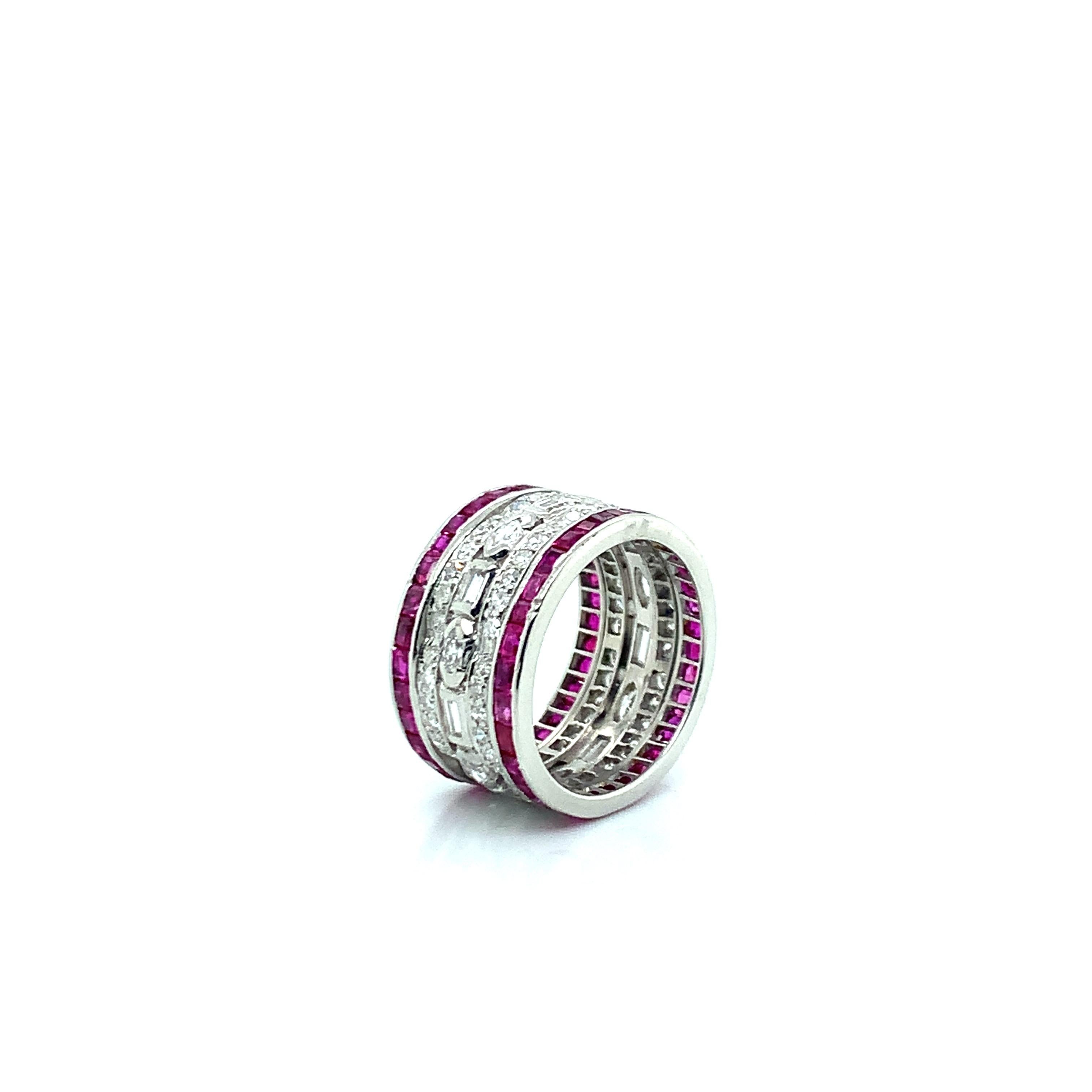 A beautiful diamond ring lined with rubies on both ends. Ring size: 4. Total weight: 7.6 grams 