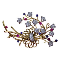 Diamond Ruby Sapphire and Gold Floral Brooch Diamond Ruby Sapphire and Gold Floral Brooch