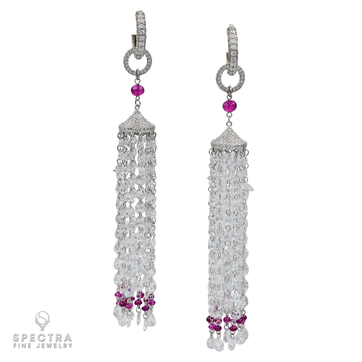 Inspired by the French art of passementerie, these Diamond Ruby Tassel Earrings are the ultimate in elegance and movement. Crafted in platinum and set with approximately 15.56 carats of pear-shaped rose-cut and round brilliant-cut diamonds, they are