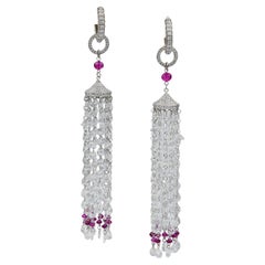 Boucles d'oreilles en platine avec pompons en diamant et rubis