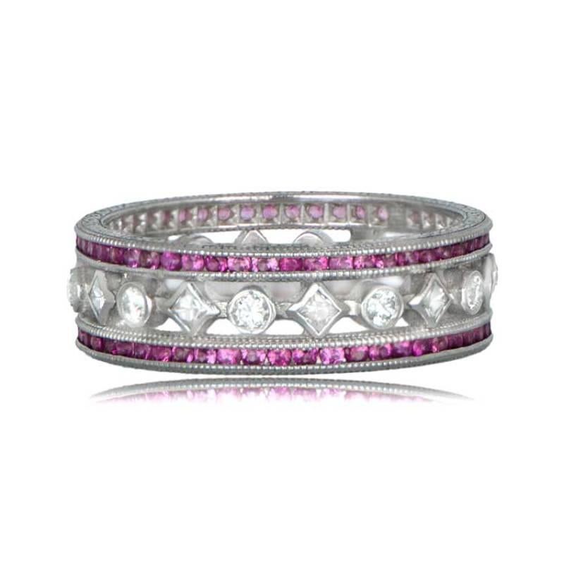 A stunning vintage estate-style wedding band featuring princess and round brilliant cut diamonds, set between two rows of round brilliant cut rubies. The band has a width of 6mm, adorned with fine milgrain detailing and lovely engravings along the