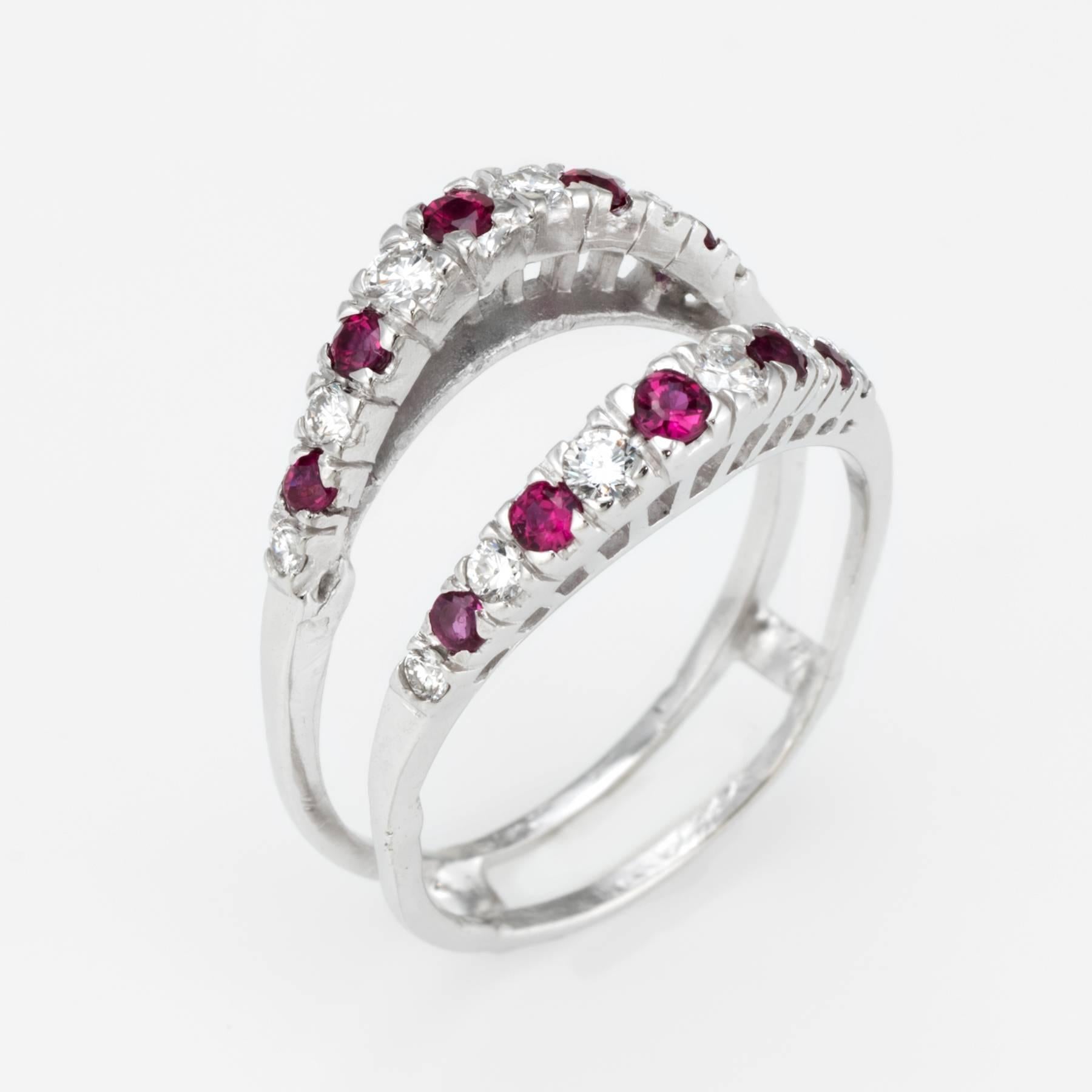 Elegant vintage wedding ring guard (circa 1950s to 1960s), crafted in 14 karat white gold. 

Round brilliant cut diamonds total an estimated 0.40 carats (estimated at H-I color and VS2-SI clarity), accented with an estimated 0.40 carats of rubies.  