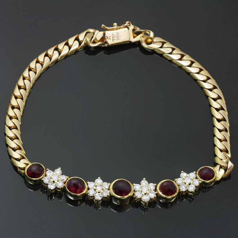 This classic vintage bracelet is crafted in 18k yellow gold and set with brilliant-cut round G-H VS1-VS2 diamonds weighing an estimated 1.0 carats and cabochon round rubies weighing an estimated 1.80 carats. Made in United States circa 1980s.
