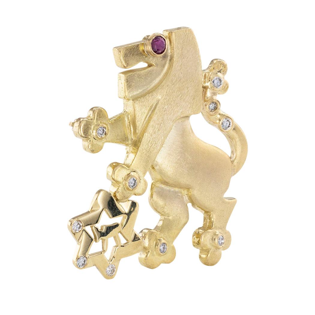 Diamond Ruby and yellow gold lion brooch pendant with Star of David and Chai, circa 1990.  Clear and concise information you want to know is listed below.  Contact us right away if you have additional questions.  We are here to connect you with