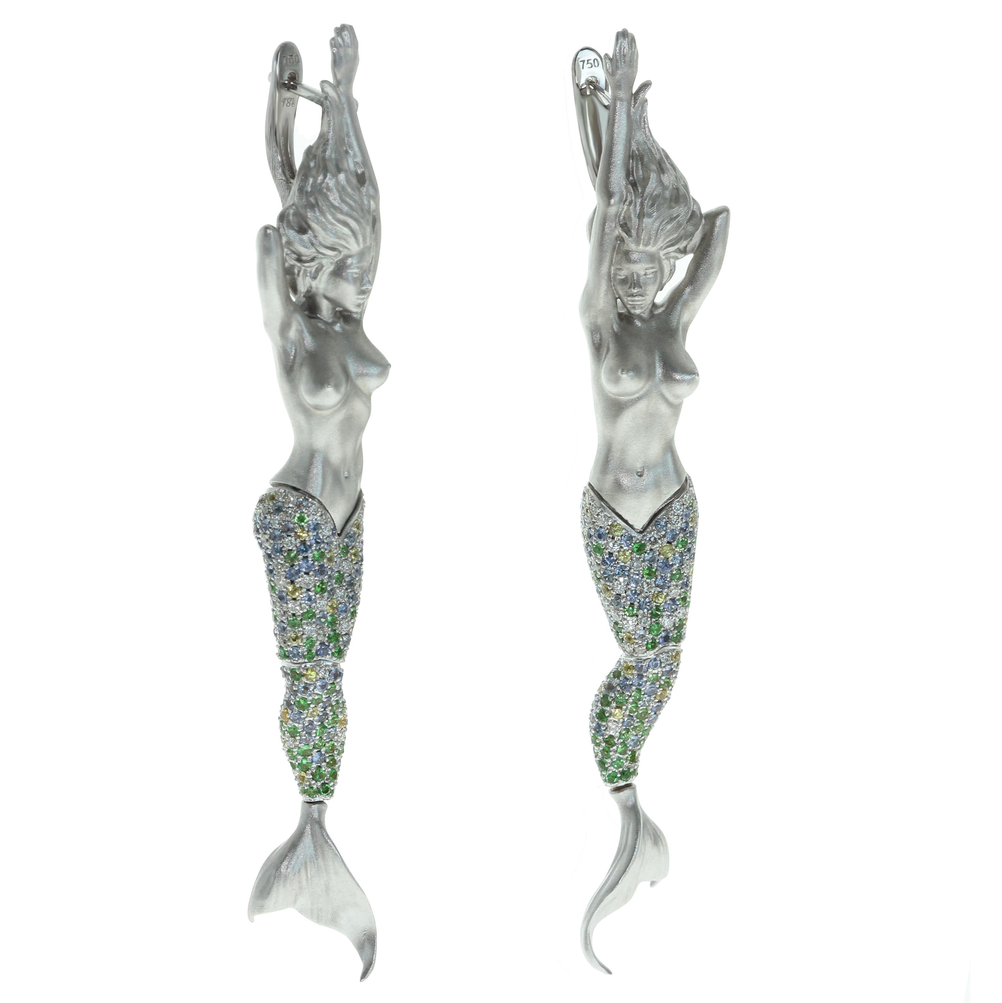 Diamond Sapphire 18 Karat White Gold Mermaid Earrings

Are You hear the Mermaids song from unhabited island?  They sing only for You. 
Feel the Mermaid sensuality once You fit this fairytale suite. All eyes will be on you only. The fairytale can be