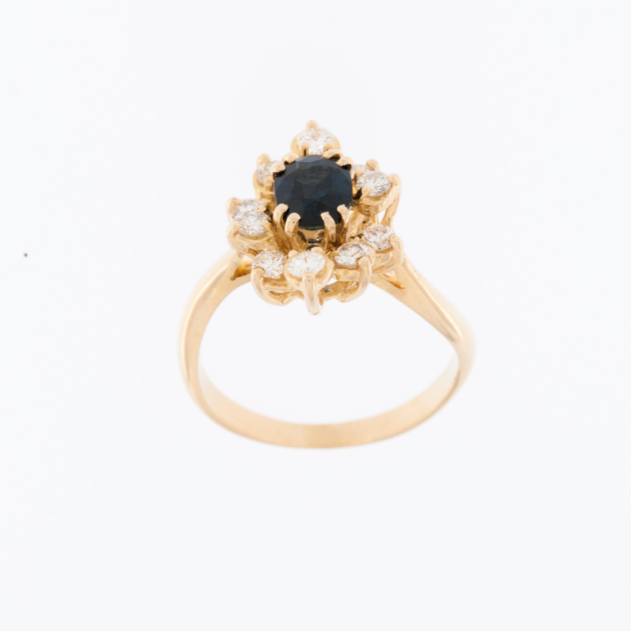 The French 18kt Yellow Gold Ring with Diamonds and Sapphire is an exquisite piece of jewelry that combines luxury and sophistication. Crafted in France, the ring is made from high-quality 18-karat yellow gold, ensuring both durability and a rich,