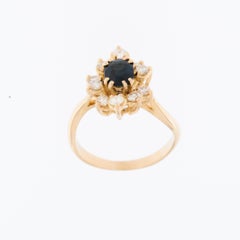 French 18 karat Yellow Gold Ring with Diamonds and Sapphire