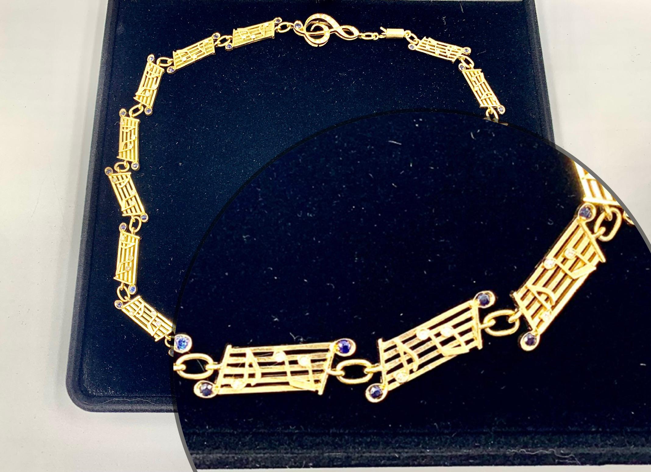 Modern Musical Symbols Substantial 18K Yellow Gold Diamond Sapphire Statement Necklace For Sale