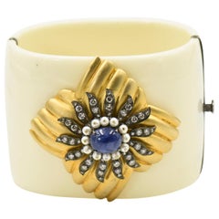 Antique Diamond, Sapphire, and Pearl Gold Floral Accent on a Bakelite Bangle Bracelet