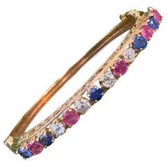 Diamond, Sapphire and Ruby 14 Karat Gold Bangle Bracelet