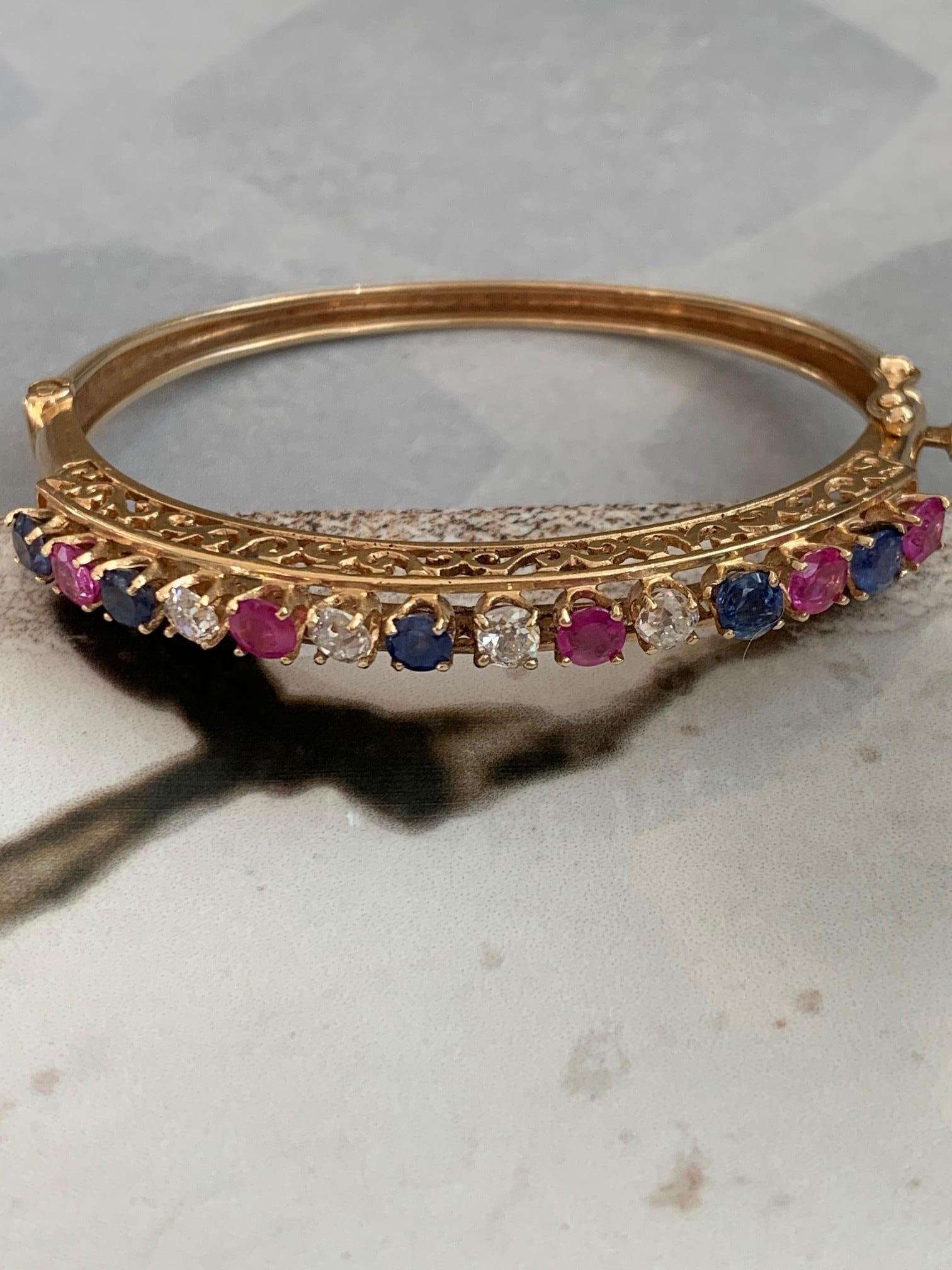 Diamond, Sapphire and Ruby 14 Karat Gold Bangle Bracelet In Excellent Condition For Sale In St. Louis Park, MN