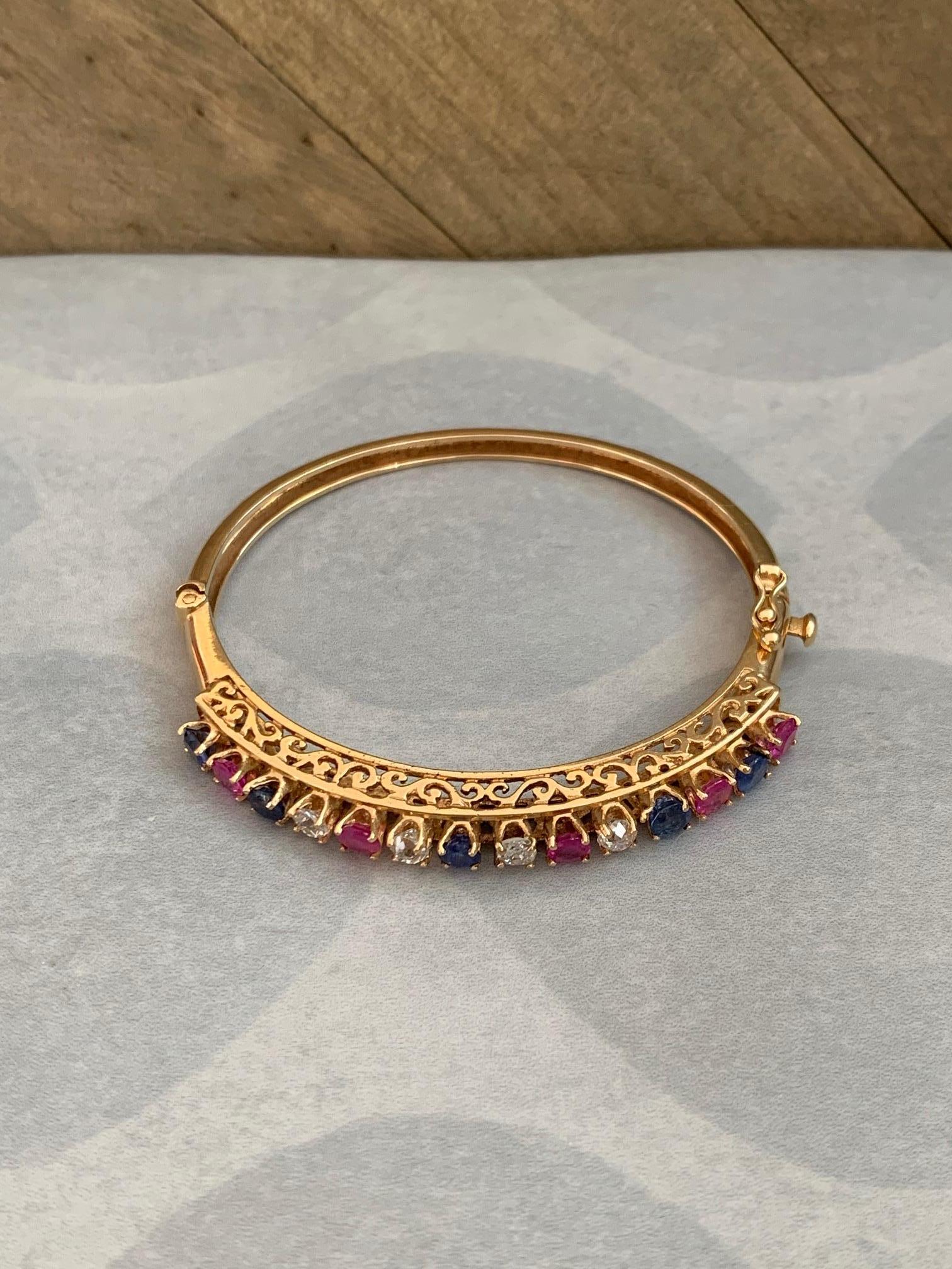 Women's Diamond, Sapphire and Ruby 14 Karat Gold Bangle Bracelet For Sale
