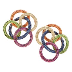 Créoles contemporaines en or jaune avec diamants, saphirs et tsavorites