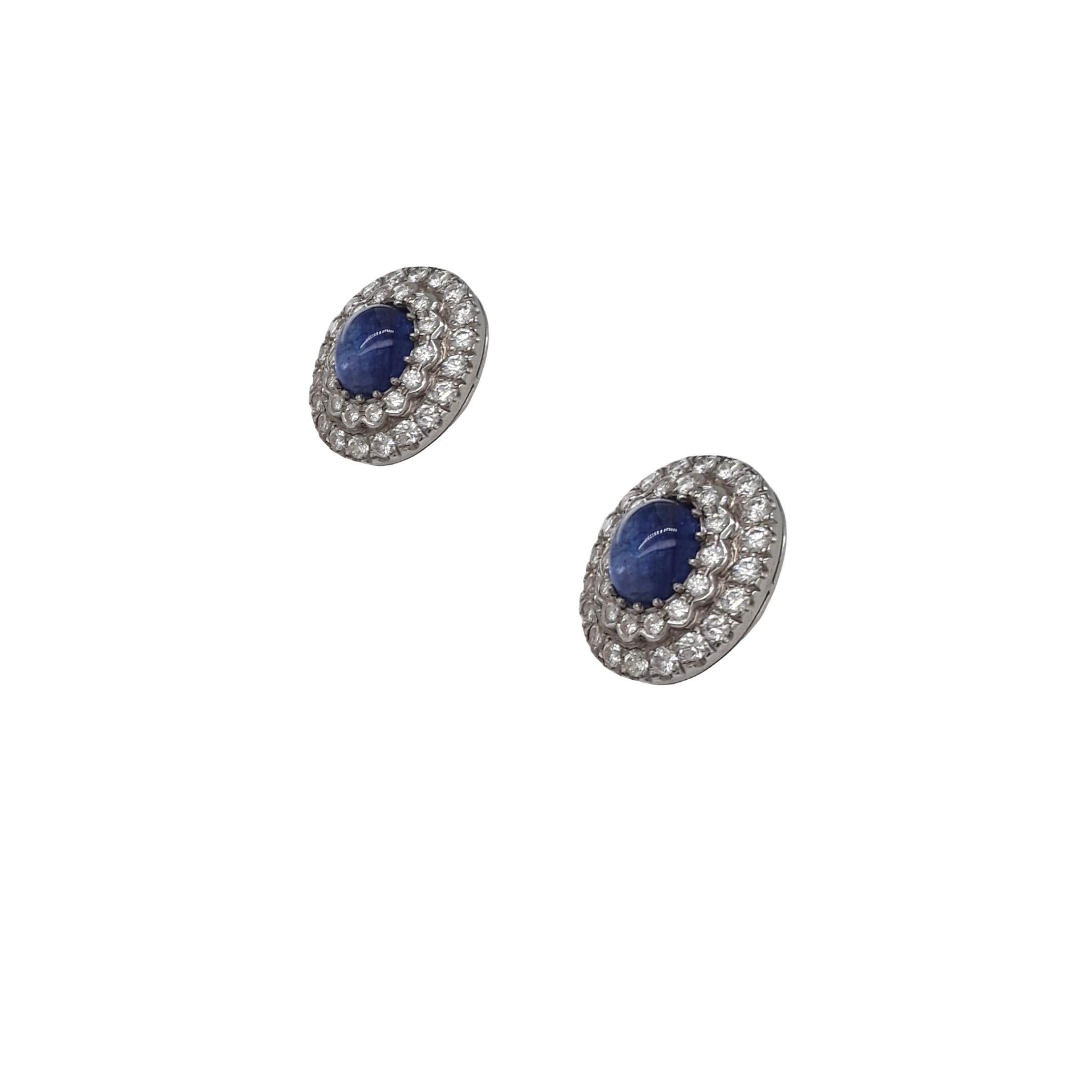 Antique Style Diamond and Sapphire Earrings made with natural sapphires and brilliant cut diamonds. Sapphire Quantity: 2 oval sapphires, Sapphire Total Weight: 8.40 carats. Diamond Quantity: 68 (round diamonds), Diamond total Weight: 2.84 carats,