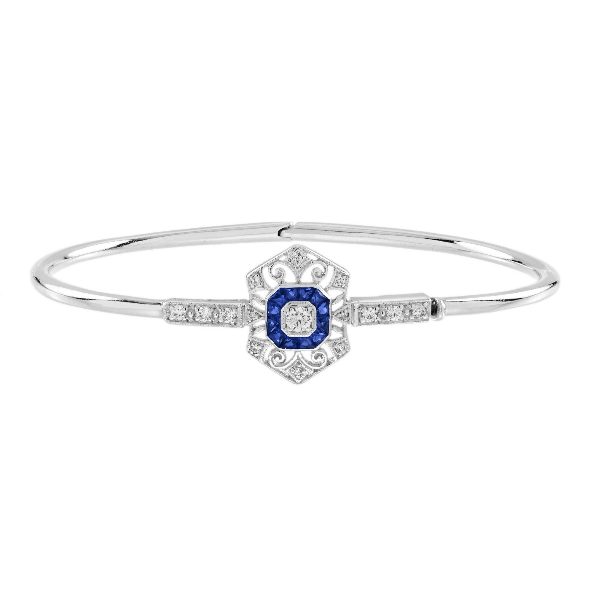 A splendid embodiment of Edwardian-inspired elegance. At the heart of this enchanting piece lies a brilliant round diamond, thoughtfully encircled by a striking French cut octagon-shaped frame, which radiates shimmer and sophistication. The openwork