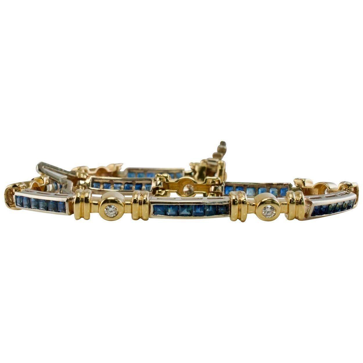 This lovely estate bracelet is finely crafted in a combination of 14K Yellow and White gold and set with natural Earth mined blue Sapphires and diamonds. There are 7 links with channel set sapphires. These gems measure 2mm each totaling 2.10 carats