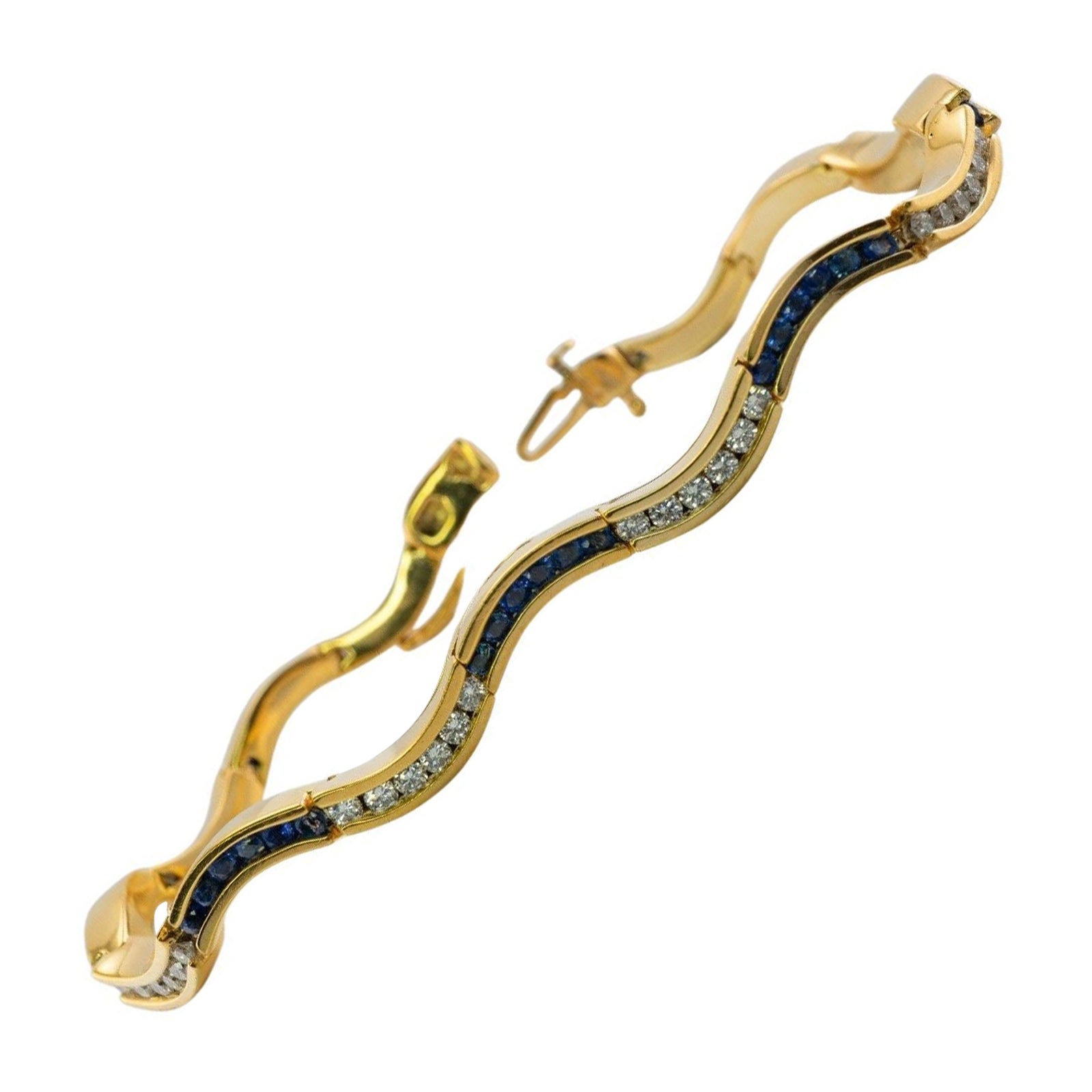 Bracciale con diamanti e zaffiri in oro 14K a forma di onda