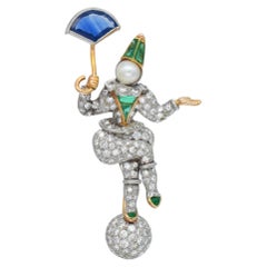 Broche « clown » en platine, sertie de diamants, de saphirs, d'émeraudes et de perles