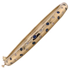 Bracelet jonc étoile en or jaune 14 carats avec diamants et saphirs