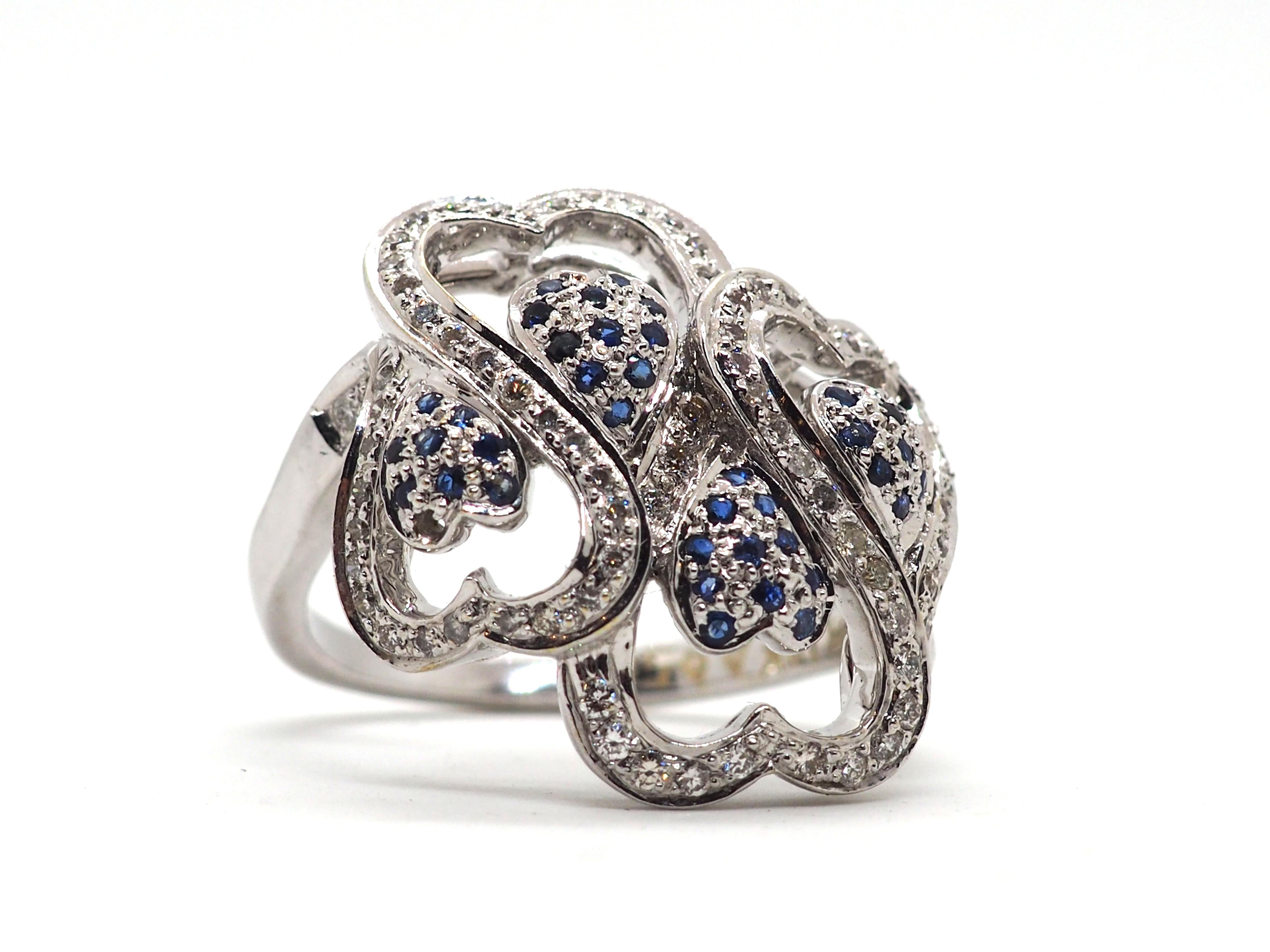 Beautiful fashion ring is crafted in a 18K white gold in a shape of the heart lines and paved with a diamonds about 0,5carat. Ring is also decorated with blue sapphires.

Eu size 59
Weight 11.5 g

The ring comes with our certificate and a