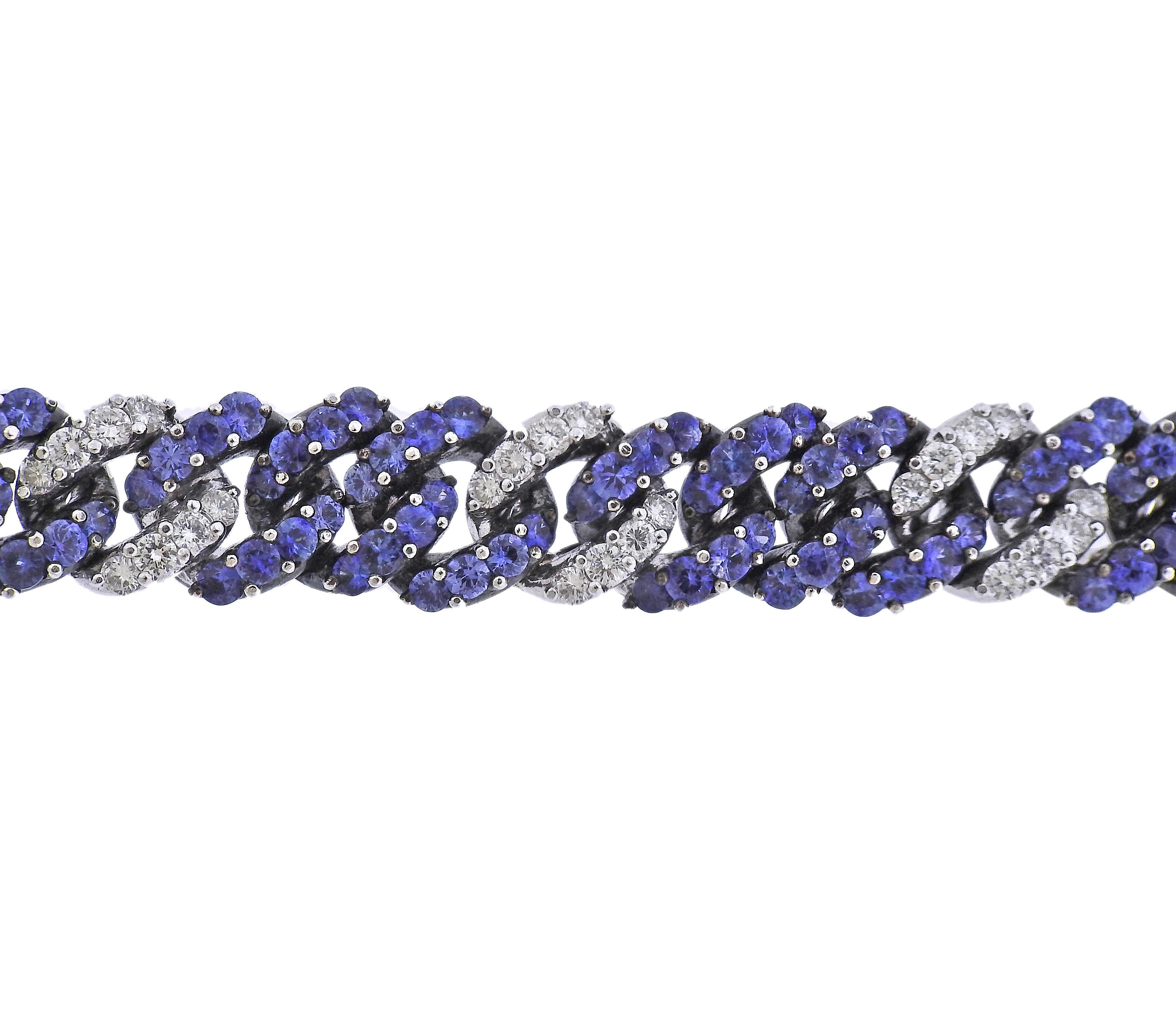 18k gold link bracelet, with approx. 15ctw in blue sapphires and 2.50ctw in VS-SI/G-H diamonds. Bracelet is 7 2/8