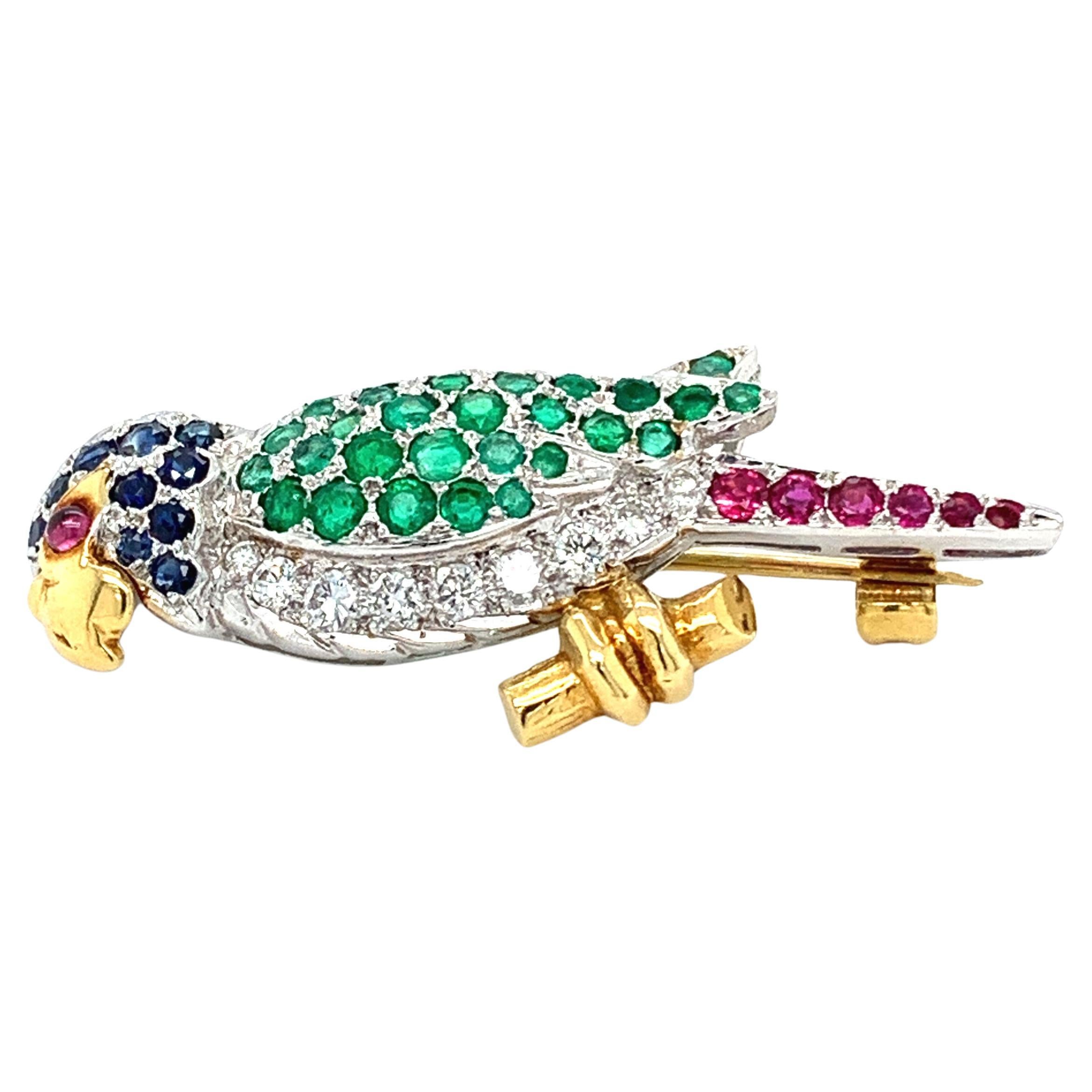 Diamond sapphire green emerald and ruby brooch 18k white gold For Sale