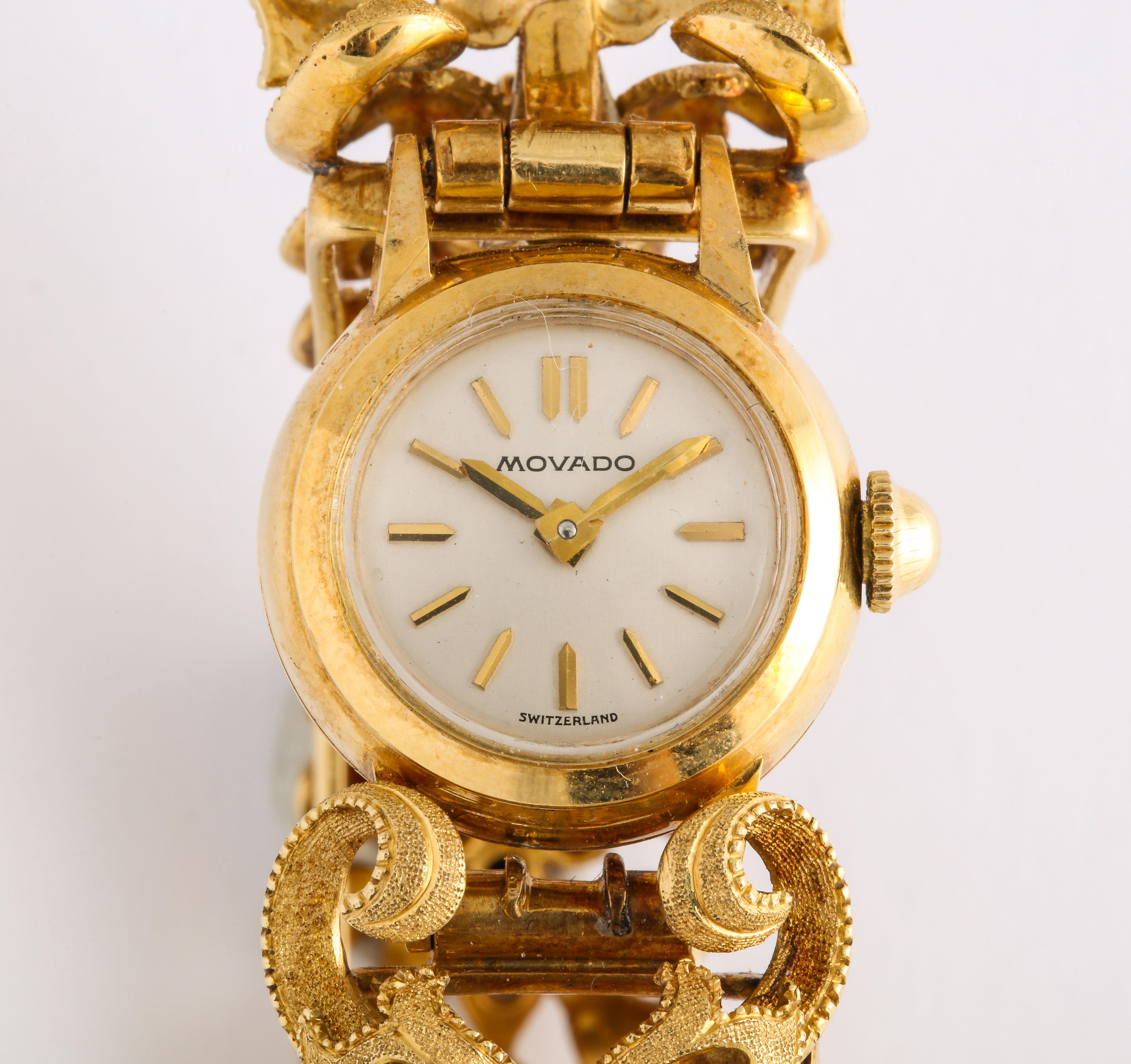 Movado Yellow Gold Watch Bracelet circa 1950-60, with the original dial.

Materials:
18k YG 33.1 dwt
Hallmarked market 18k

Original dial c. 1950- 1960

Measurements:
7 ½ Long x ¾ wide x 3/8 deep