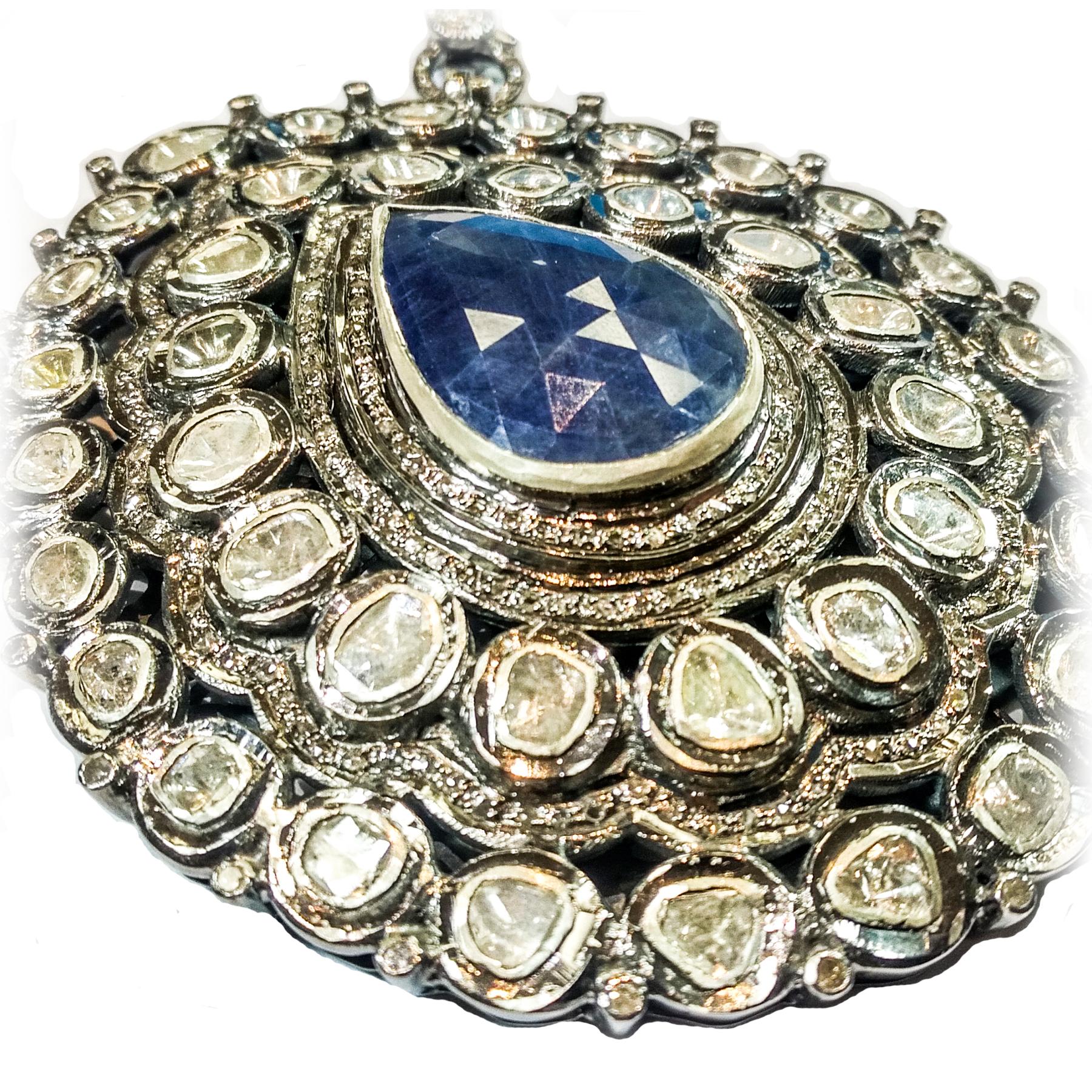 Moghul inspired, diamond (polki) 9.5 carats, sapphire 18 carats, necklace with pearls. Contemporary handcrafted pear shape blue sapphire surrounded with diamond (polki) mounted in bazel setting, and beautiful basket back design, accented with