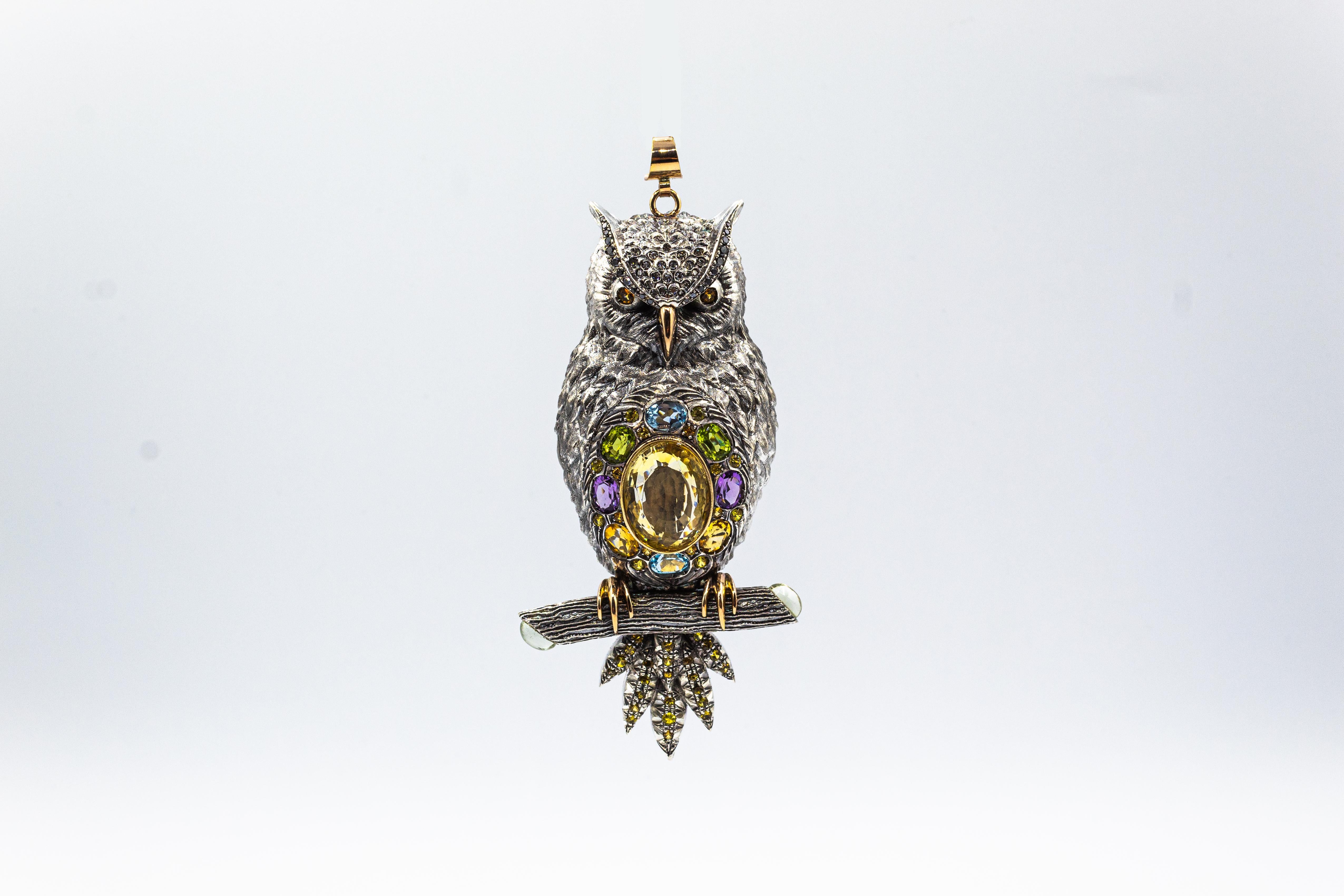 This Pendant is made of 9K Yellow Gold and Sterling Silver.
This Pendant has 0.33 Carats of White Diamonds.
This Pendant has 0.35 Carats of Black Diamonds.
This Pendant has 2.30 Carats of Yellow Sapphires.
This Pendant has a 16.00 Carats