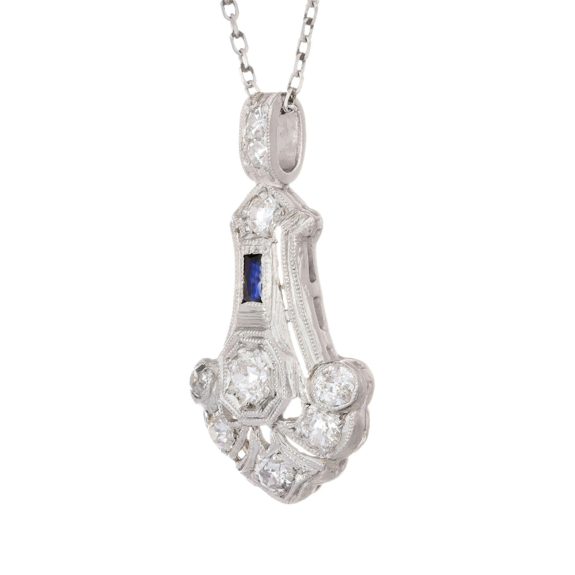 Diamond and sapphire necklace. 9 old min cut diamonds set in platinum with a center French cut sapphire on a 16 inch platinum chain. 

9 old mine diamonds approx total weight .45 cts I-J, SI3
1 French cut sapphire .03cts
16 inch chain 
Length: