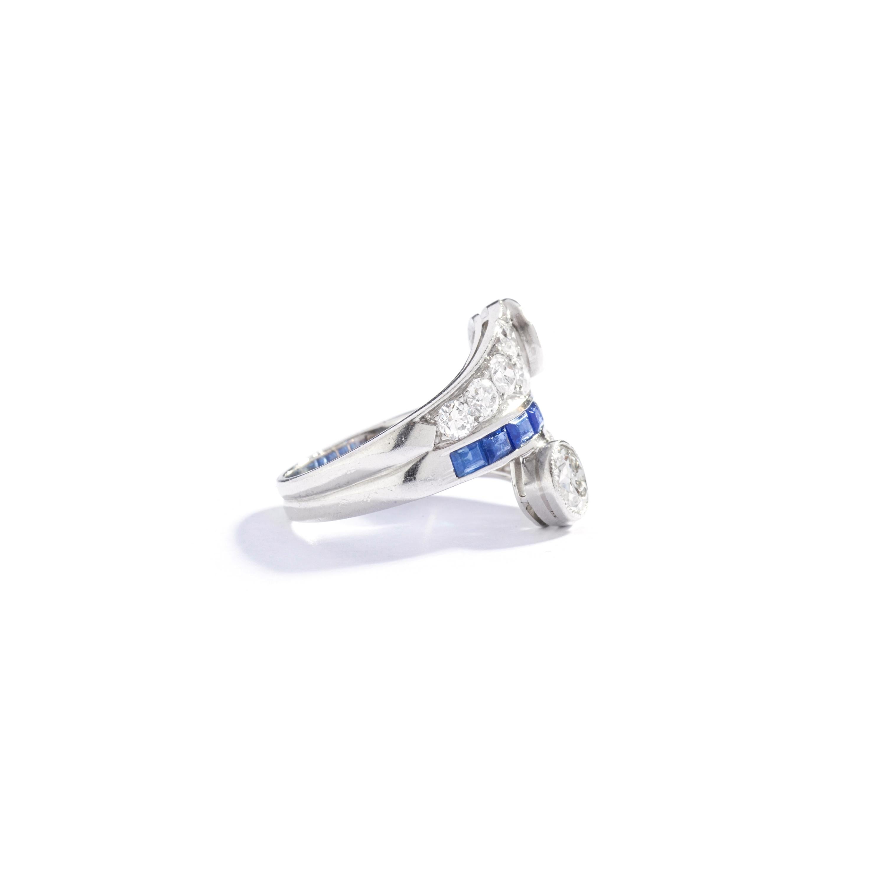 Diamond Sapphire Platinum Crossover Ring For Sale 1