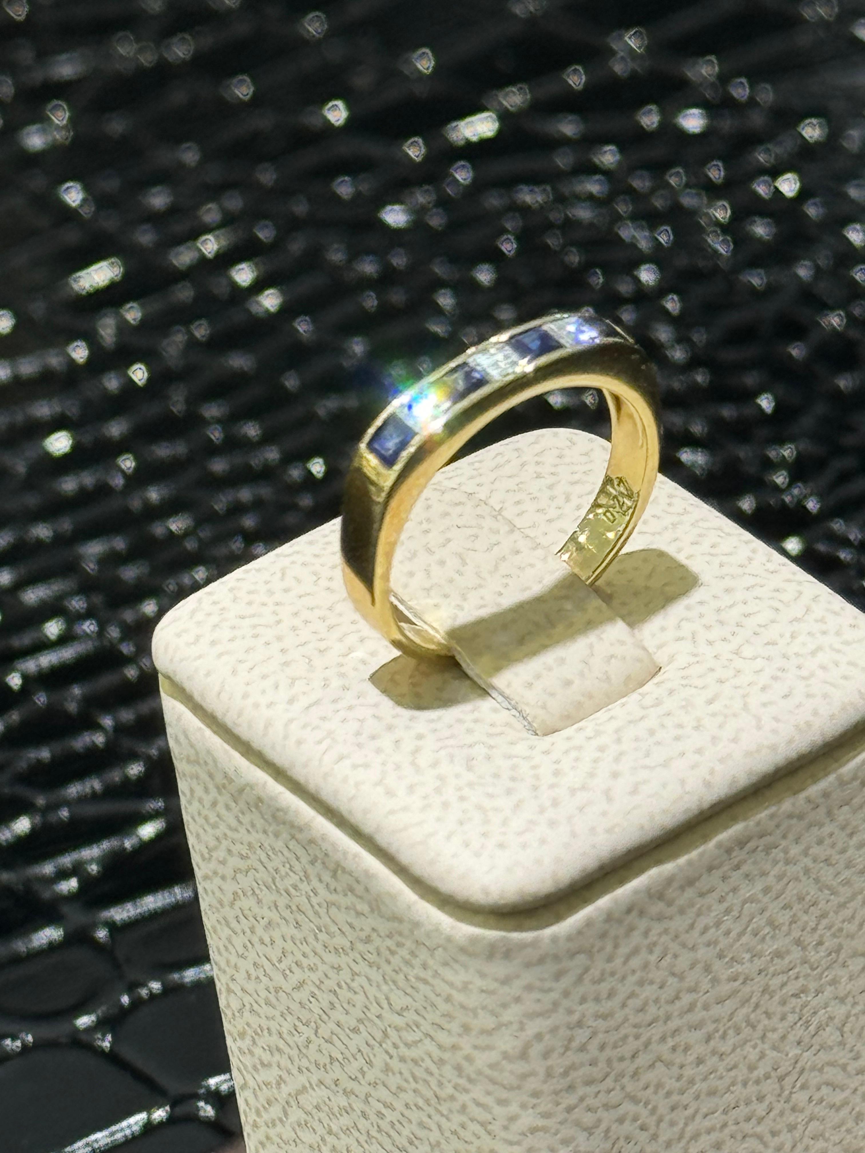 Diamond & Sapphire Ring In 14k .

0.27 carats in princess cut diamonds,

0.40 carats in blue sapphires.

Size 6.25

Shank width on the side where the stones are - 3mm