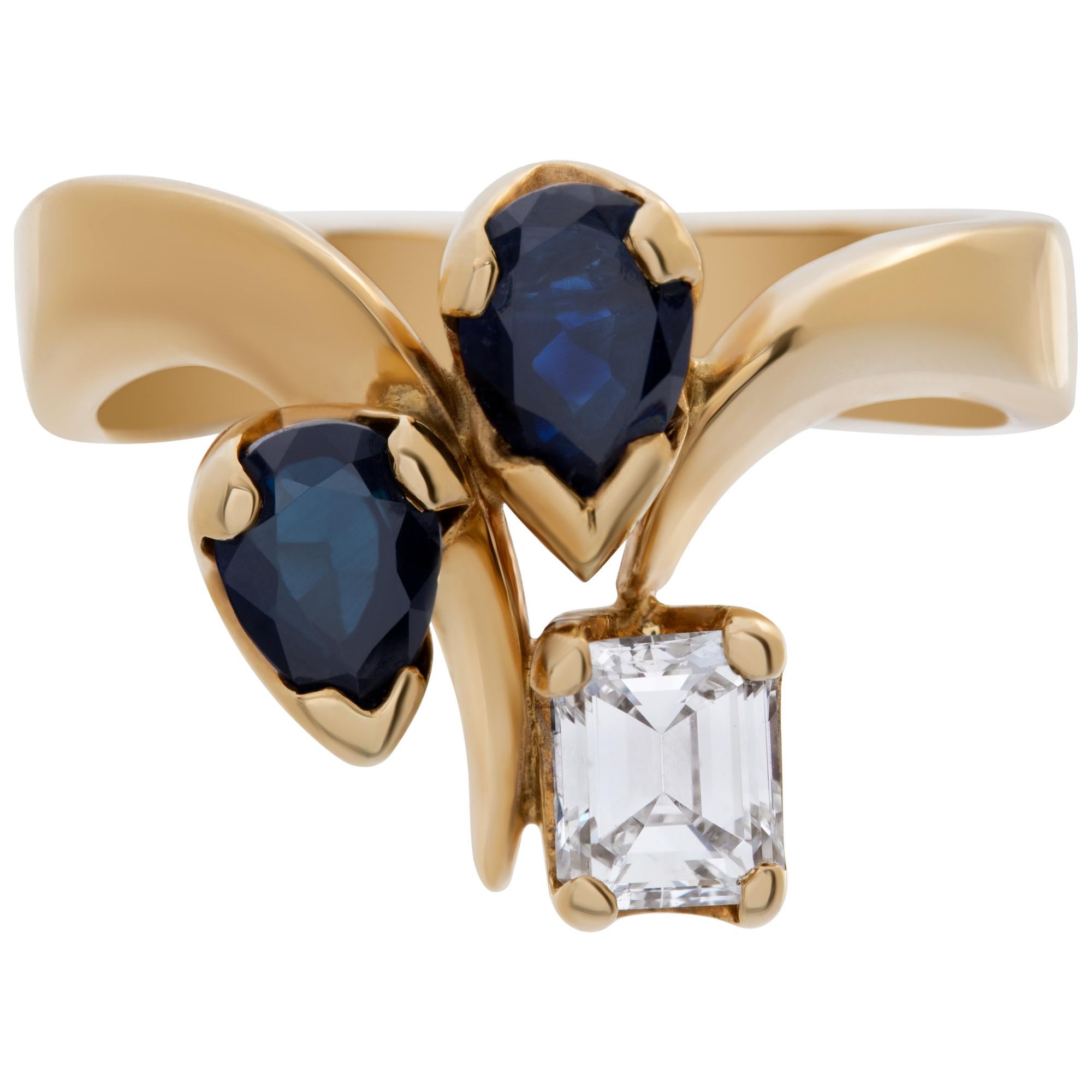 Pretty diamond & sapphire ring in 14k yellow gold. Size 7.25.This Sapphire ring is currently size 7.25 and some items can be sized up or down, please ask! It weighs 4.6 pennyweights and is 14k.
