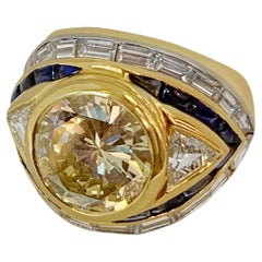 Bague en or 18 carats avec diamant et saphirs